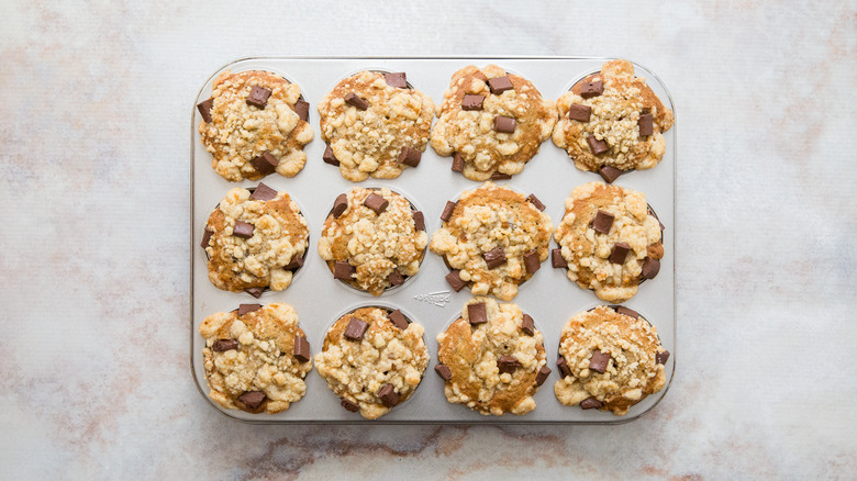 banana chocolate chip muffins in tin