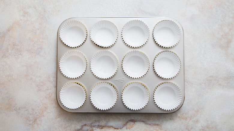 lined muffin tin on table