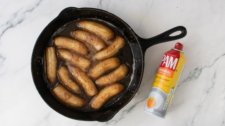 Bananas Foster in skillet next to cooking spray bottle