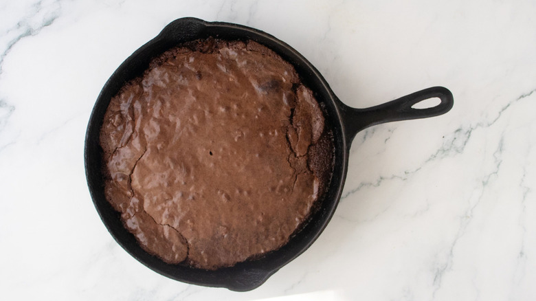 Baked brownie in skillet