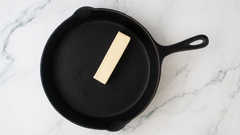 Stick of butter in cast iron skillet