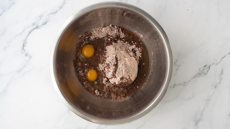 Brownie mix and eggs in bowl