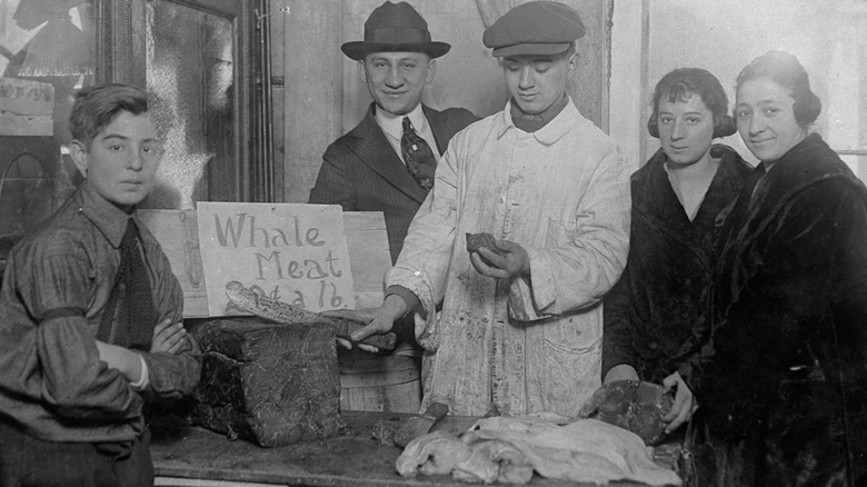 People selling whale meat in olden times