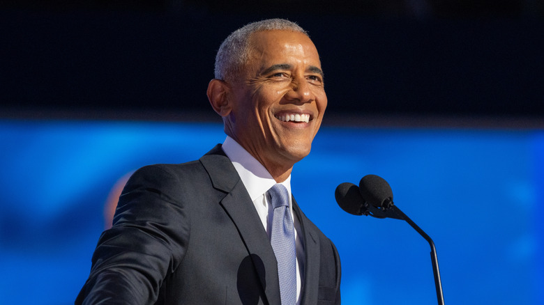 President Barack Obama speaking in a suit and tie