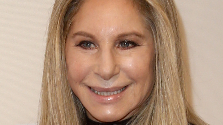 Head shot of Barbra Streisand with long hair.