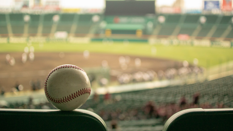 Ball on baseball seat in stadium