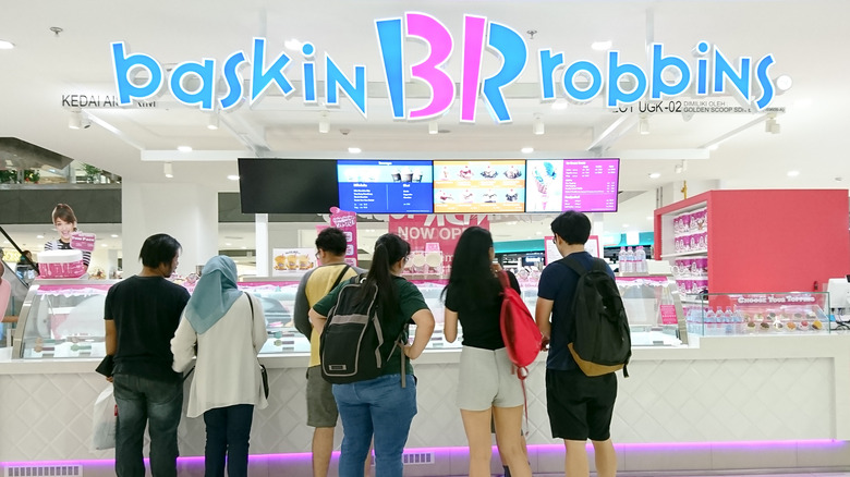 People standing in line at Baskin-Robbins