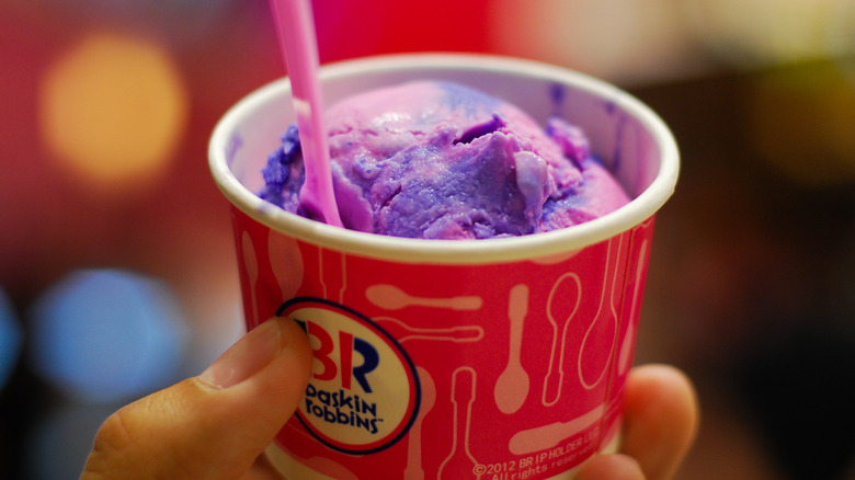 scoop of pink and purple Baskin-Robbins Ice Cream in a cup with pink spoon