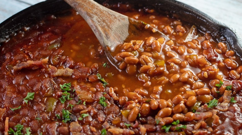 baked beans with wooden spoon