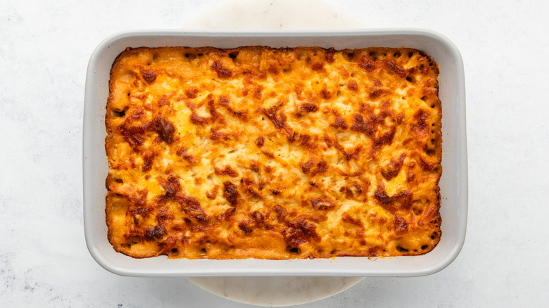 Freshly baked BBQ chicken mac & cheese in baking dish