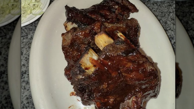 Ribs with sauce on platter