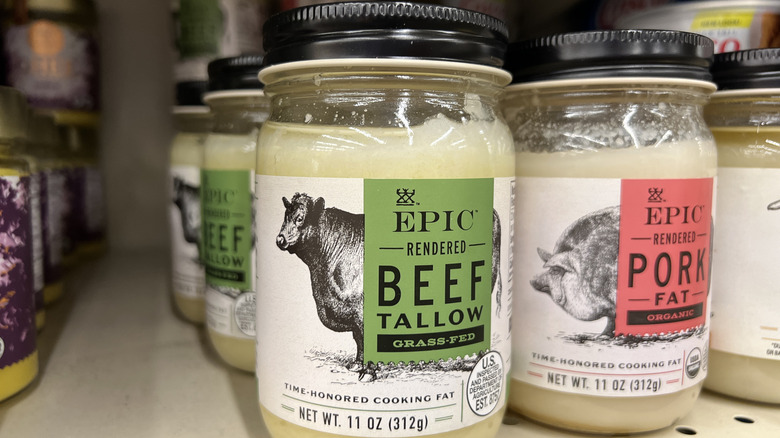 A container of beef tallow on a store shelf