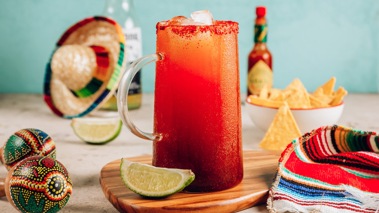 Michelada with hot sauce and lime
