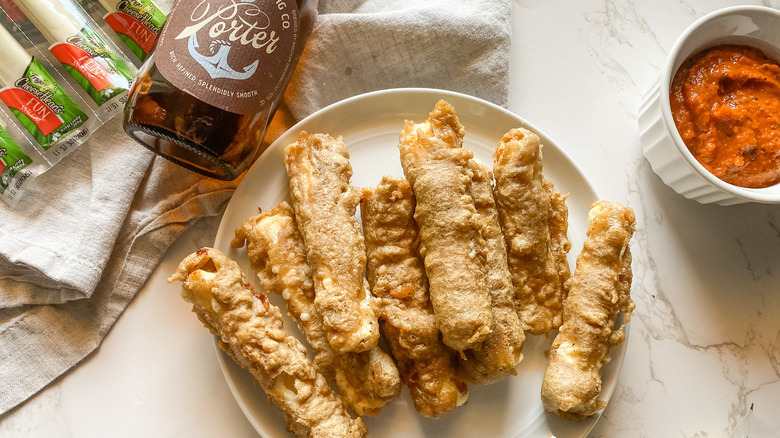 beer battered mozzarella sticks plated