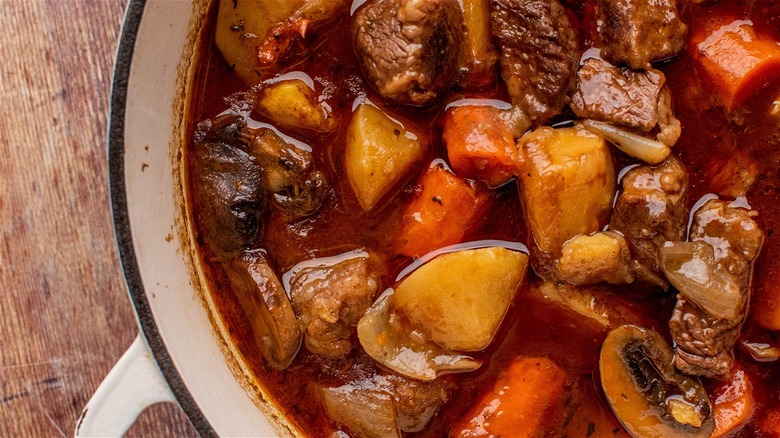 meat and potatoes in pot