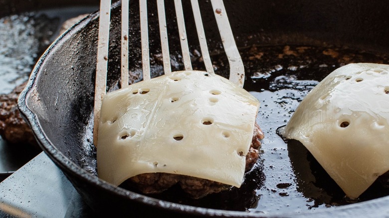 burger patty with Swiss cheese