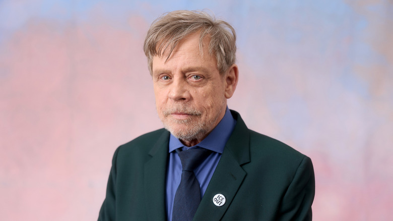 Mark Hamill wearing a suit and tie