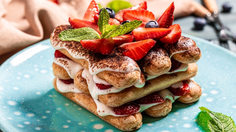 Tiramisu covered in berries