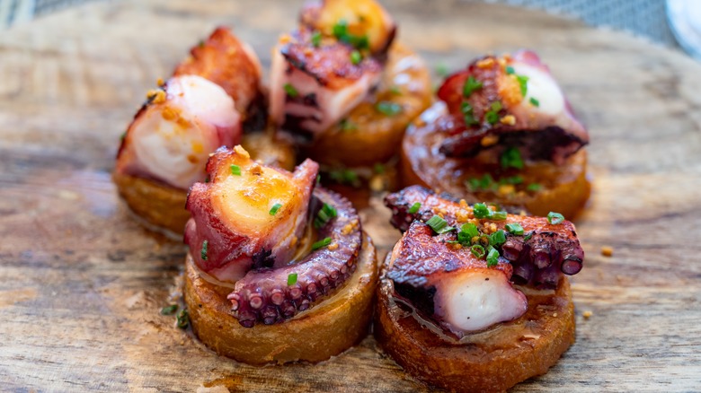 octopus appetizer on toasts