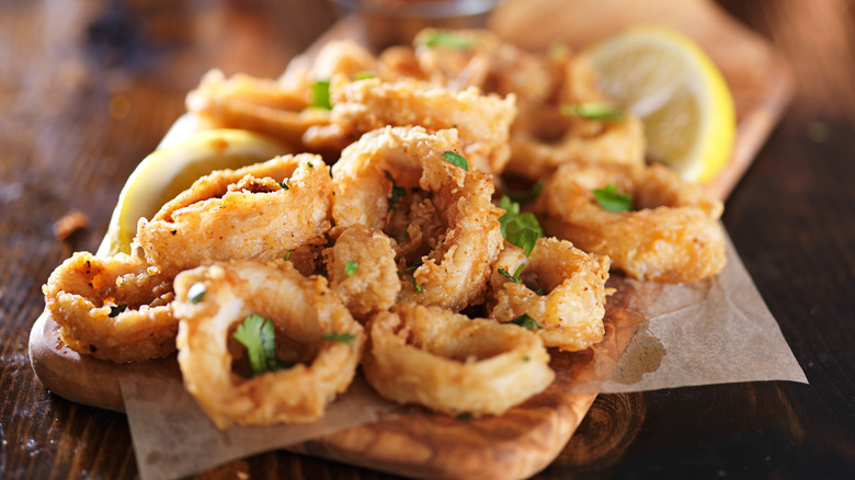 fried calamari portion on board