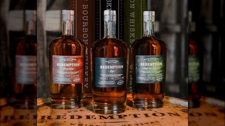 Three varieties of Redemption whiskeys with the rye whiskey in the center.