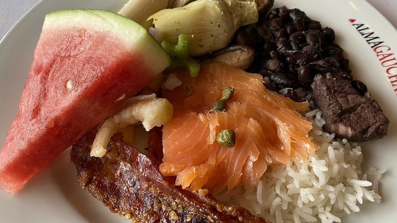 meat, fruit, rice, and beans
