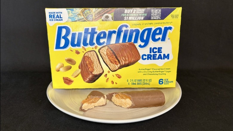 Butterfinger ice cream bar on plate with box.