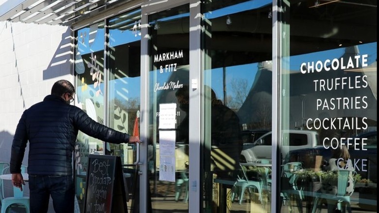 Man opening door to Markham & Fitz Chocolate