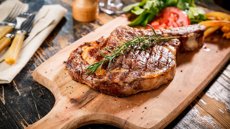 Ribeye steak on cutting board