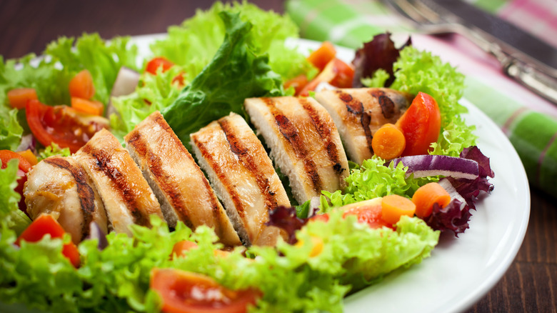 grilled chicken salad on plate