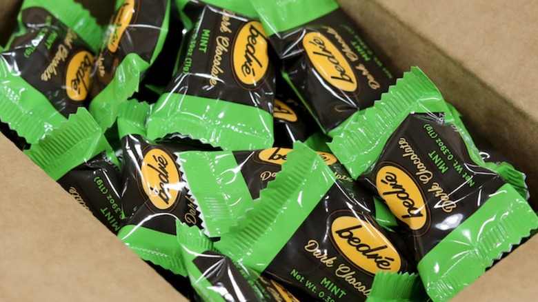 Box of wrapped mint meltaway chocolates.