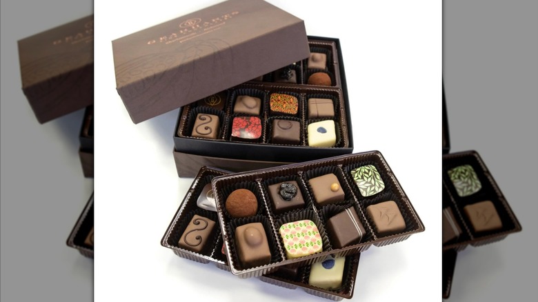 Boxes of artful chocolate candies.