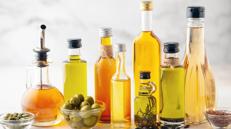 Various cooking oils in glass bottles