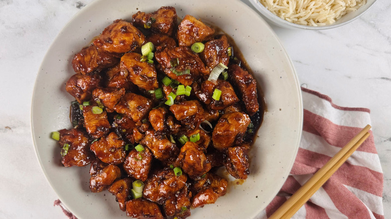 Saucy spicy chicken topped with green onions