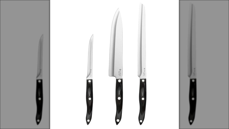 Three types of kitchen knives with black handles against white background.