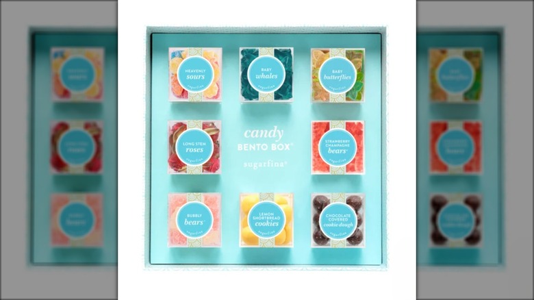 Gift box containing smaller, individually wrapped boxes of candy.