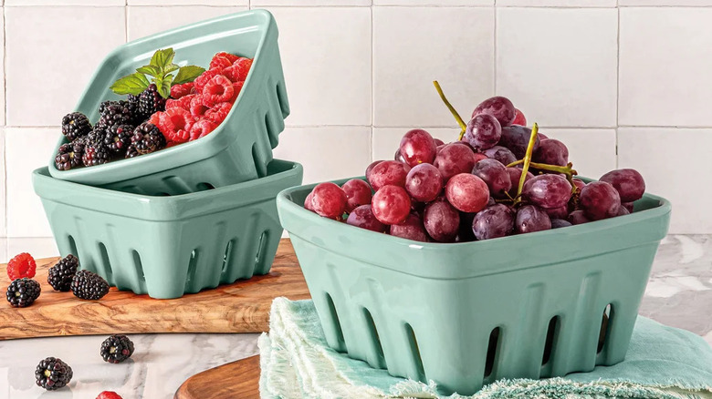 Reusable fruit baskets with berries and grapes