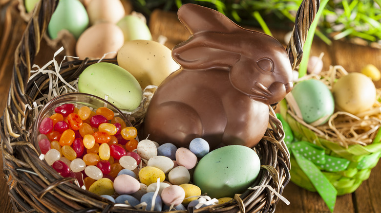 chocolate bunny with easter basket candy eggs