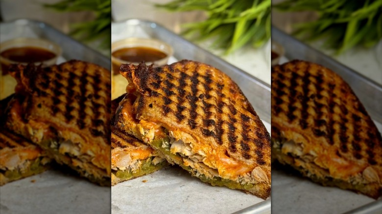 Fish sandwich with sauce on the side