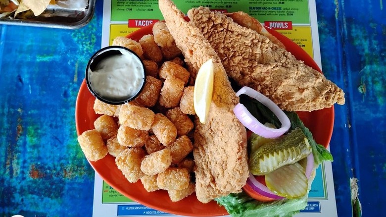 Captain's Catch Flounder Sandwich with tater tots at shaggy's