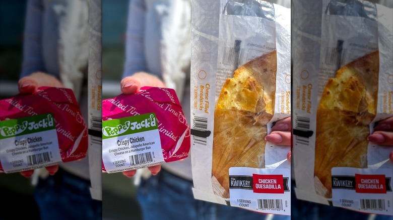 woman holding a wrapped crispy chicken sandwich and chicken quesadilla from Kwik Trip