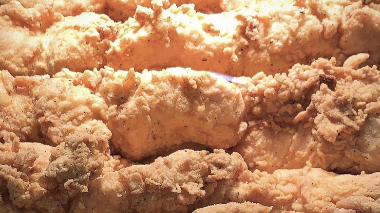 A pile of chicken on a stick