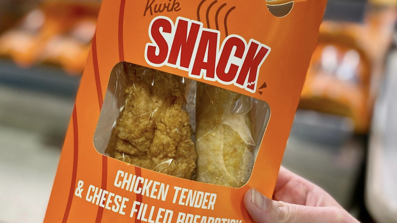 Orange Kwik Trip packaging with chicken tender and bread stick