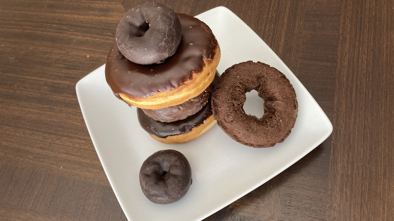 Variety of different chocolate donuts from grocery store bakeries