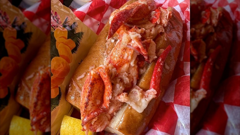 A lobster roll on checkered paper from Fat Cheeks Hawaii