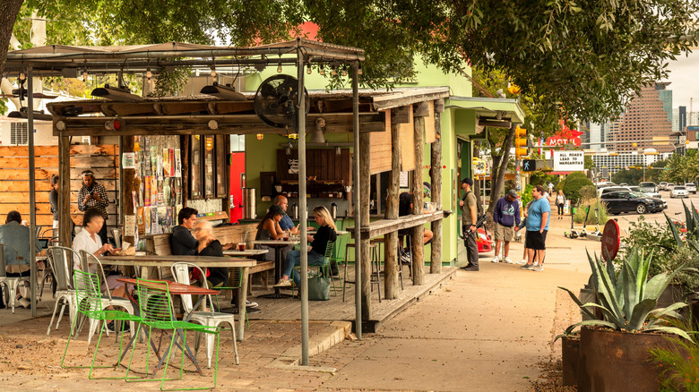 Restaurants line a street in Austin, Texas