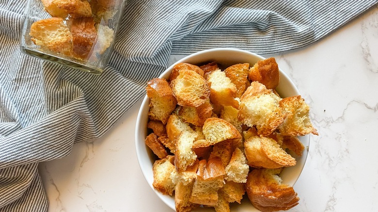 Croutons with crumpled striped towel