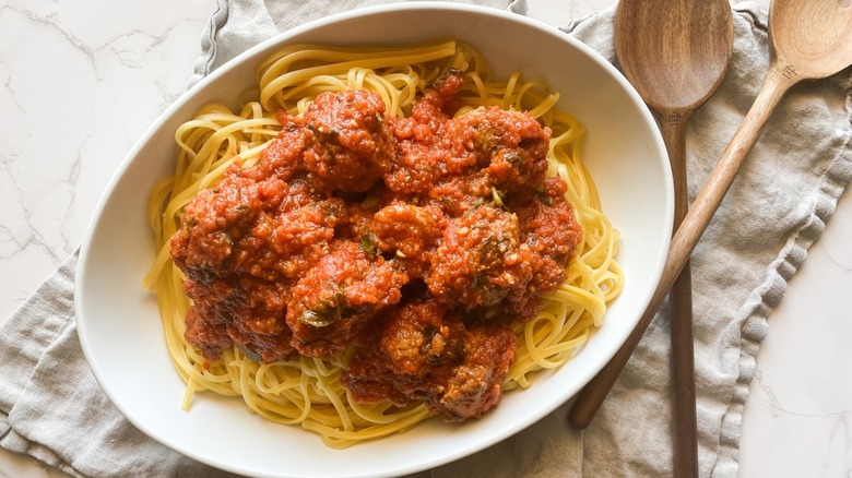 Spaghetti with meatballs on a plate.