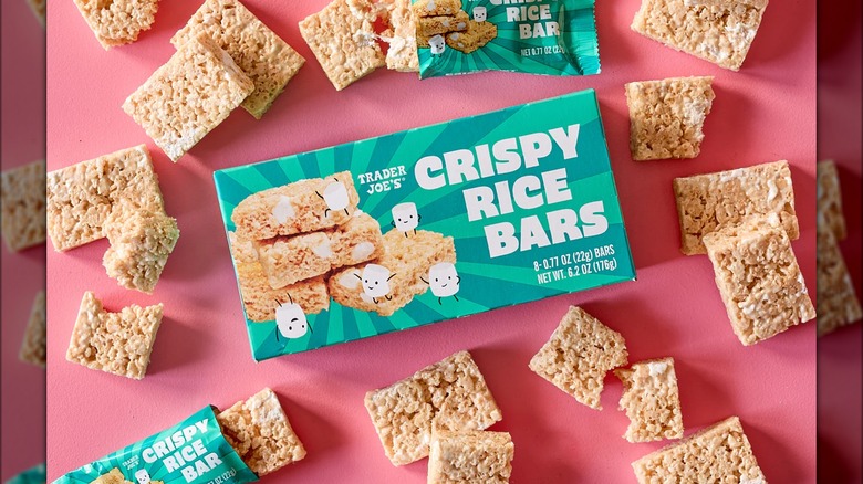 Package of crispy rice dessert bars with dessert bars surrounding it.
