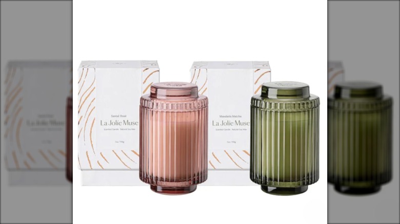 2 scented candles in glass holders